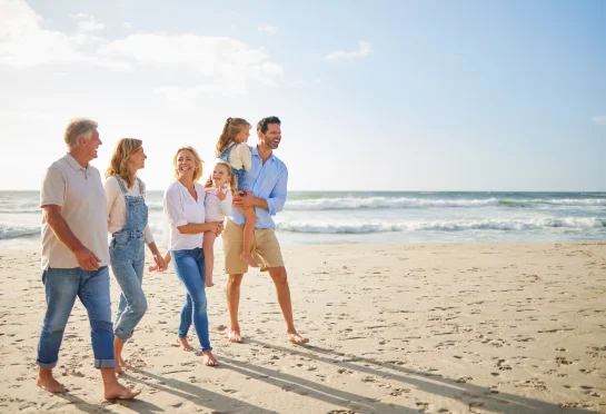 Different generations together on the beach